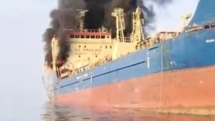 Smoke billows from an oil tanker under U.S. sanctions, that was hit off Oman's Musandam peninsula, in this screen grab from a video obtained by REUTERS on March 1, 2026.