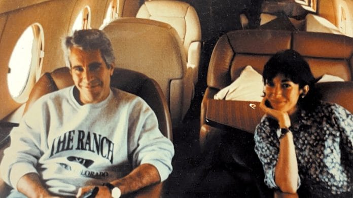 FILE PHOTO: Jeffrey Epstein and Ghislaine Maxwell are seen in this image released by the Department of Justice in Washington, D.C., U.S., on December 19, 2025 as part of a new trove of documents from its investigations into the late financier and convicted sex offender Jeffrey Epstein. U.S. Justice | Department/Handout via REUTERS/File Photo