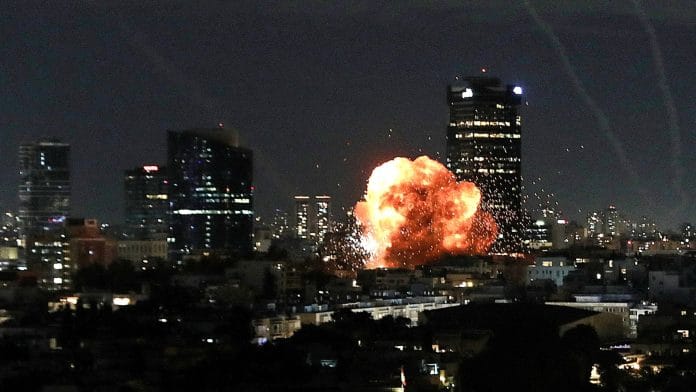 An explosion caused by a projectile impact after Iran launched missiles into Israel in Tel Aviv, Israel, February 28. | REUTERS/Gideon Markowicz