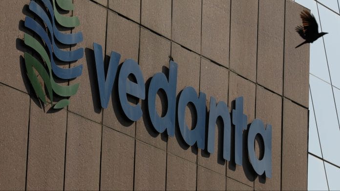 A bird flies past the logo of Vedanta installed on the facade of its headquarters in Mumbai, India January 31, 2018. | REUTERS/Danish Siddiqui