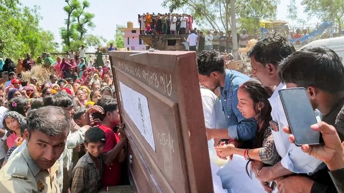 Wife of the young man killed in an Iranian missile attack in Riyadh, Ritu Devi, breaks down after the mortal remains arrive at his native village, in Sitapur on Wednesday. | ANI Video Grab