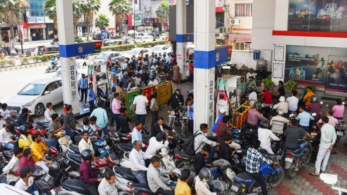 Vehicles queue at a fuel pump in Prayagraj Thursday | Photo: ANI