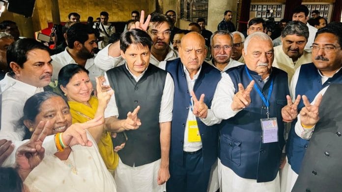 Congress leaders with party's newly elected Rajya Sabha MP Karamveer Bauddh outside Haryana Assembly on 16 March 2026 | X@DeependerSHooda