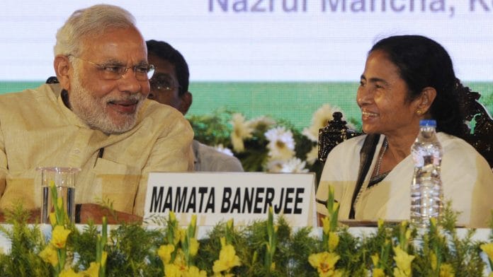 Prime Minister Narendra Modi and West Bengal CM Mamata Banerjee | Getty Images