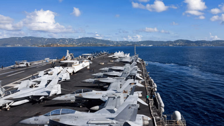 US carrier leaves Iran fight after fire onboard, at least 2 sailors injured