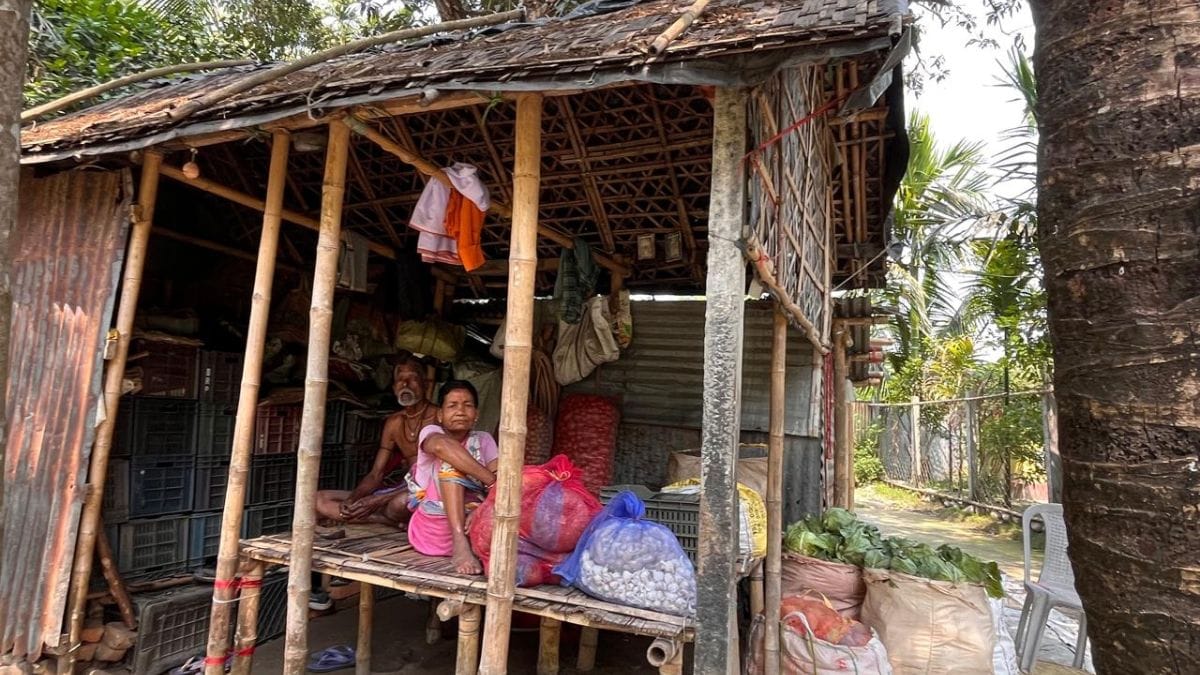 Dhaneshwar Das and his wife Gita outside their house in Purbo Para, Mekliganj | Photo: Moushumi Das Gupta | ThePrint