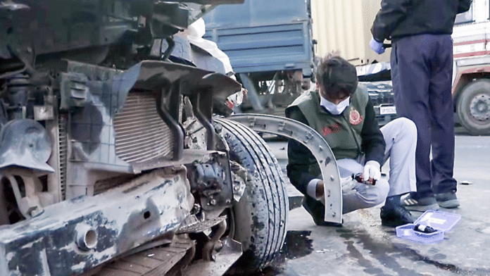 A forensic expert inspects the site of an accident on Delhi-Meerut Expressway | ANI File