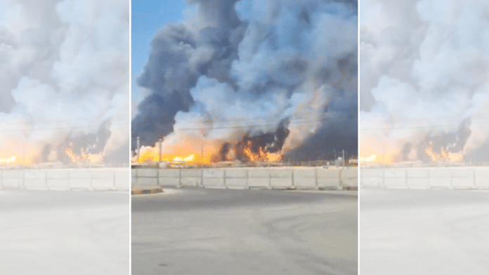Smoke and fire rise near the South Pars gas field following an attack, amid the U.S.-Israeli conflict with Iran, in Bushehr Province, Iran | Social Media/via REUTERS