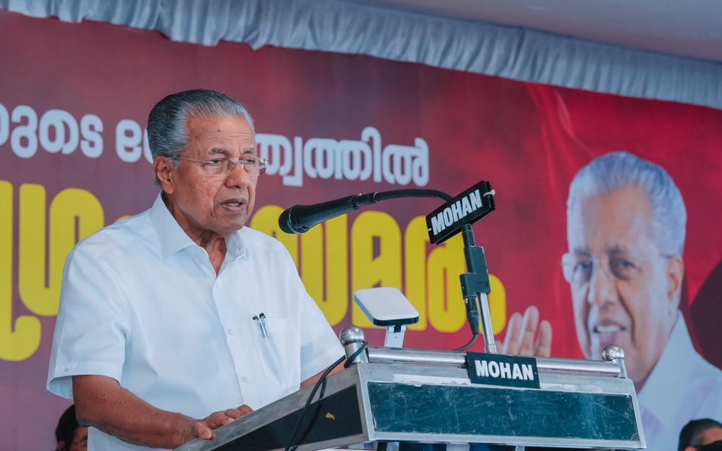 The CM addresses the public at a gathering | credit: