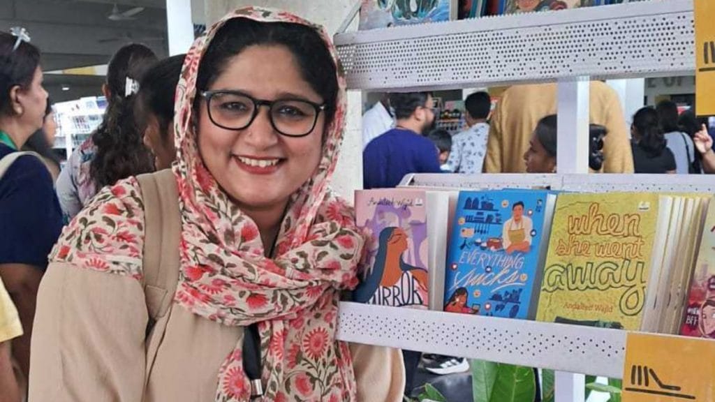 Author Andaleeb Wajid with her books on a shelf at a literature festival. Special arrangement