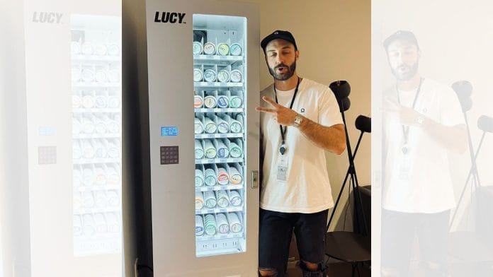 Eliano A Younes, Strategic Engagement Head at Palantir, poses with a nicotine pouch vending machine | X