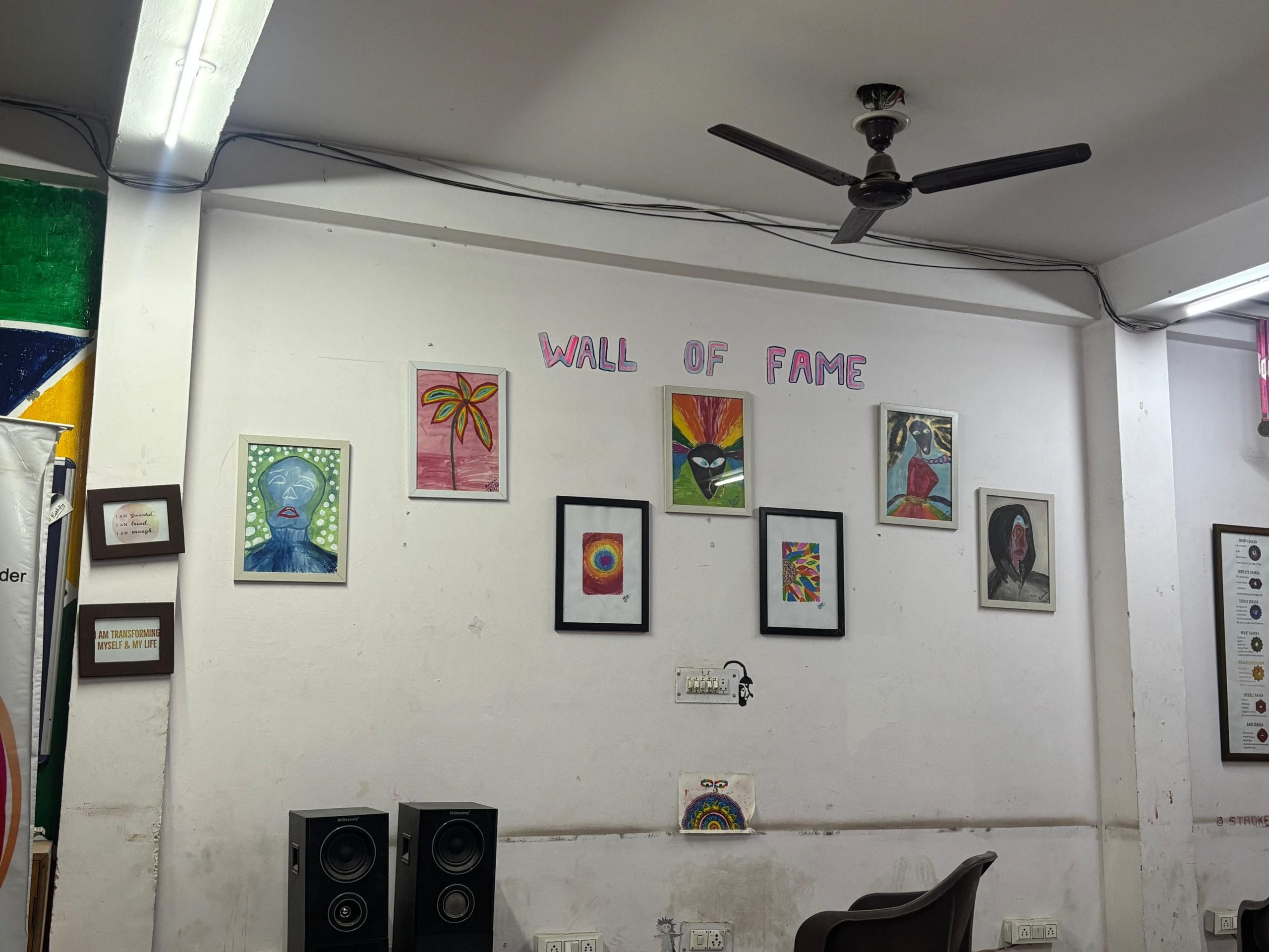 Colourful curtains and artwork brighten up the space at the Garima Greh, though unease lingers beneath | Photo: Vitasta Kaul, ThePrint