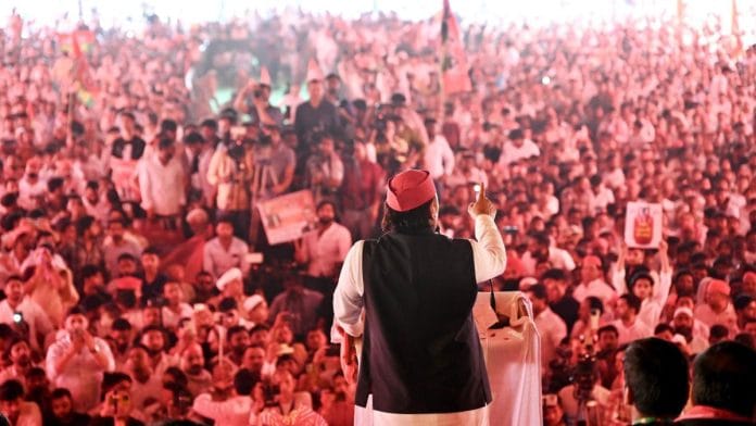 SP chief Akhilesh Yadav addressing the rally in Dadri Sunday | X: @yadavakhilesh