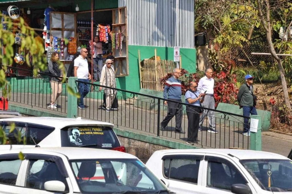 Visitors stream into Mawlynnong on a weekday. The village charges Rs 200 per vehicle for parking | Photo: Praveen Jain | ThePrint 