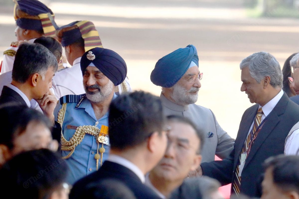 Air Chief Marshal Amar Preet Singh and Delhi L-G Taranjit Singh Sandhu with senior MEA officials at Rashtrapati Bhavan | Praveen Jain | ThePrint