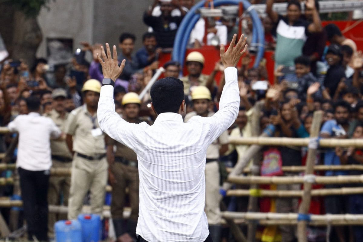 All India Trinamool Congress general secretary and MP Abhishek Banerjee waves to the crowd during the election rally | Praveen Jain | ThePrint