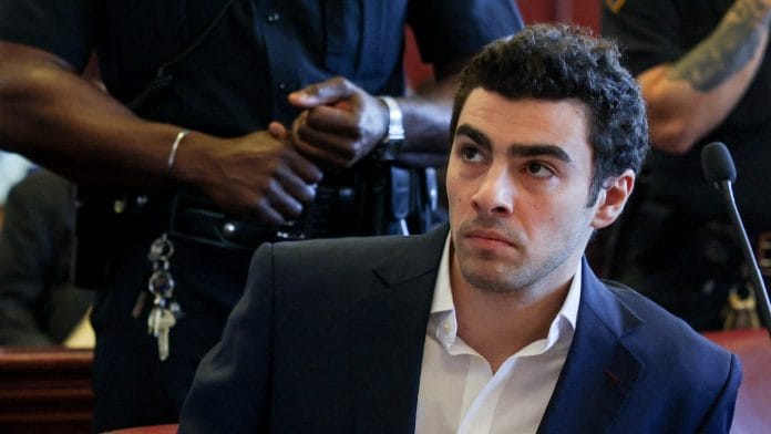 FILE PHOTO: Luigi Mangione attends an evidentiary hearing in the murder case of UnitedHealthcare CEO Brian Thompson, at the Manhattan Supreme Court in New York, U.S., December 18, 2025. | REUTERS/Shannon Stapleton/Pool/File Photo