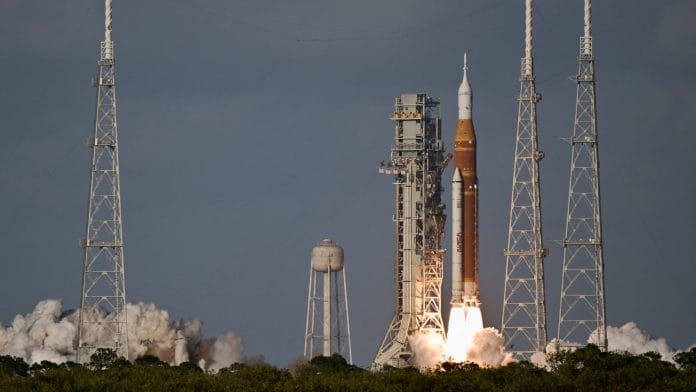 NASA's Artemis II mission to fly by the moon, comprising of the Space Launch System (SLS) rocket with the Orion crew capsule, lifts off from the Kennedy Space Center in Cape Canaveral, Florida, U.S. April 1, 2026. | REUTERS/Steve Nesius