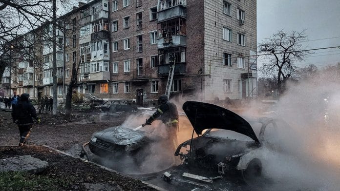 A firefighter works at the site of a Russian drone strike, amid Russia's attack on Ukraine, near the town of Konotop, Sumy region, Ukraine April 10, 2026. | Press service of the State Emergency Service of Ukraine in Sumy region/Handout via REUTERS