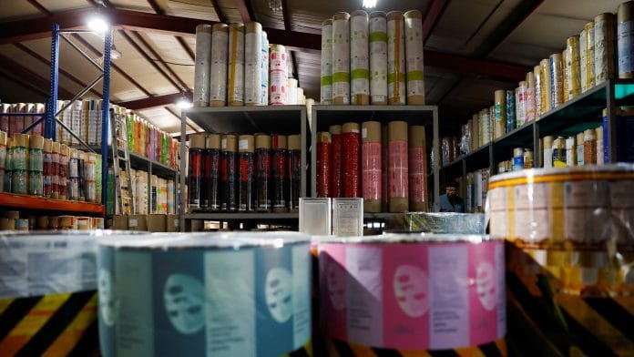 Printed pouches for facial masks that have yet to be made into finished products are seen stacked at a factory in Pyeongtaek, South Korea, April 8, 2026. | REUTERS/Kim Soo-hyeon