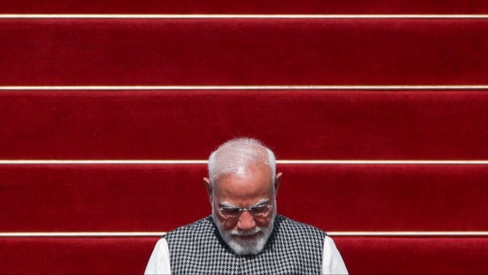 India's Prime Minister Narendra Modi disembarks a plane as he arrives at Ben Gurion International Airport in Lod, near Tel Aviv, Israel February 25, 2026. | REUTERS/Shir Torem/File Photo