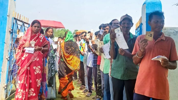 Early morning Voters' queue in front of polling station, in Jhargram on Thursday. | @CEOWestBengal X/ANI Photo