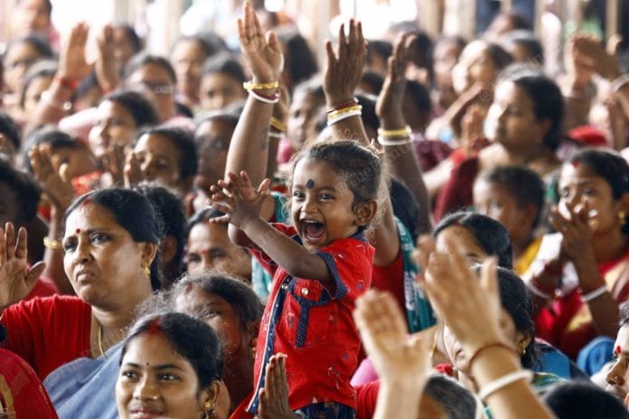 A girl cheering while Abhishek Banerjee arrives to address his rally at Kanthi in east Medinipur, West Bengal | Praveen Jain | ThePrint