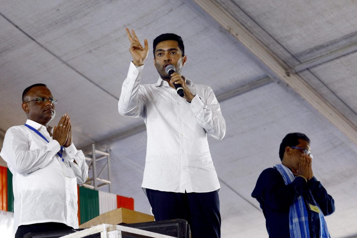 TMC leader Abhishek Banerjee introducing their candidate Manav Paduya and Piyush Kanti Panda to the crowd for upcoming election | Praveen Jain | ThePrint