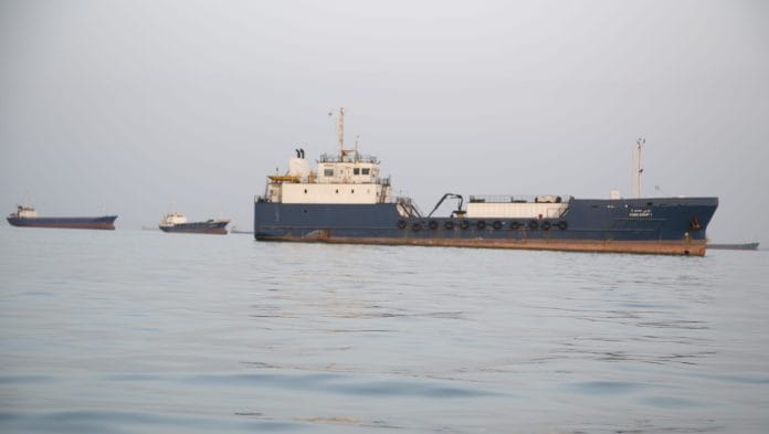 Ships are anchored near the shoreline on April 22, 2026 in Bandar Abbas, Iran. Bandar Abbas is a port city and the capital of Hormozgan Province, along the Persian Gulf and Strait of Hormuz. Earlier today, Iran's Islamic Revolutionary Guards Corps said it had attacked and seized two ships near the Strait of Hormuz as it tried to assert control over the critical waterway. The incidents came the day after U.S. President Donald Trump announced an extension of a ceasefire between his country and Iran, and after Iran refused to attend the latest proposed round of peace talks in Islamabad | BLOOMBERG