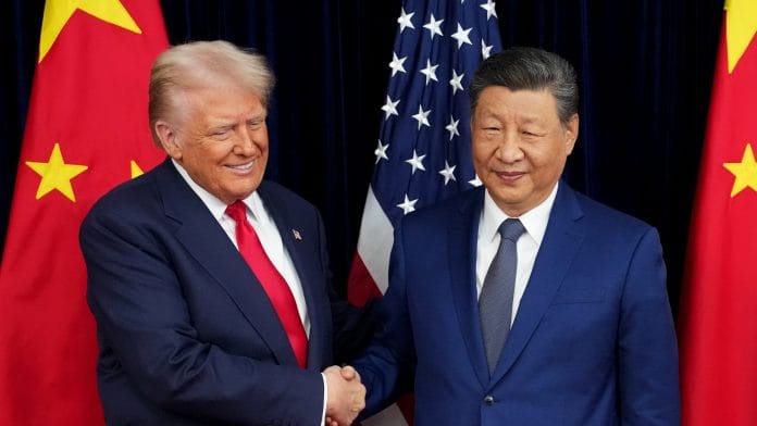Donald Trump greets Xi Jinping in Busan, South Korea, on Oct. 30, 2025. | Bloomberg