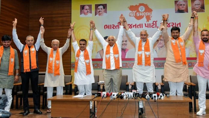 Gujarat CM Bhupendra Patel, Dy CM Harsh Sanghavi, Gujarat BJP chief Jagdish Vishwakarma and others at press conference in Gandhinagar on 28 April 2026 | X@ sanghaviharsh