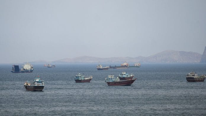 Ships and boats in the Strait of Hormuz, Musandam, Oman, on 22 April, 2026 | Stringer/Reuters