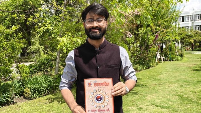 Akeel Tantray proudly shows off an ABVP booklet on Chhatra Shakti (Student Power). | Mahira Khan