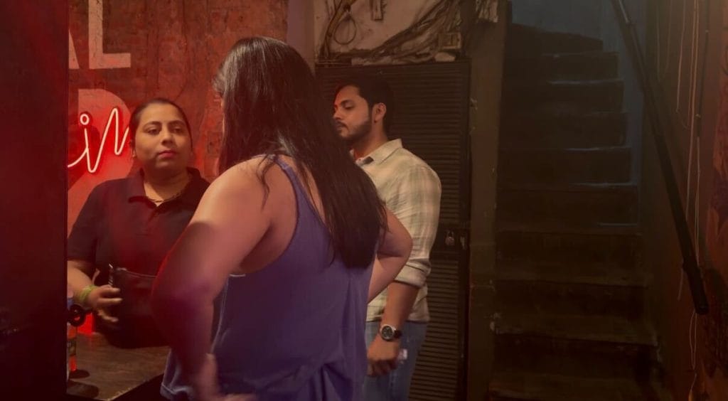 Monica, 37, checking a woman's bag at her duty | Saman Husain, ThePrint