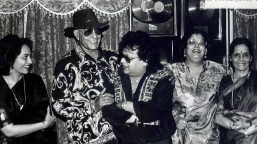 Bappi Lahiri, Amrish Puri, Kalpana Iyer at a party. Image: @BappiLahiri/Facebook