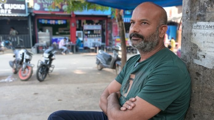 Journalist Ranu Tiwari, who runs the YouTube channel Bastar Talkies, sits under a banyan tree in Jagdalpur | Suraj Singh Bisht/ThePrint