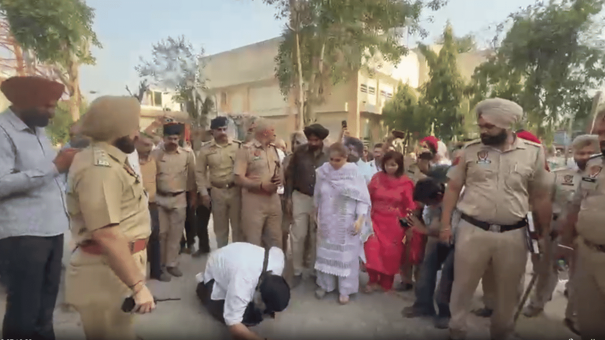 Gurjeet Singh Khalsa bows to the ground after coming down from the tower | By Special Arrangement