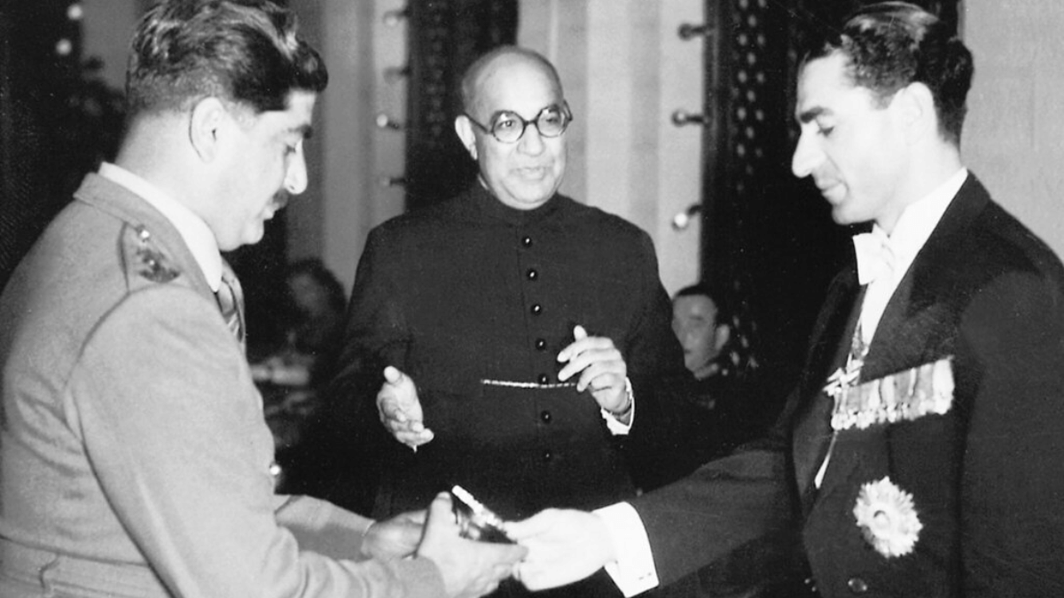 Lt. Col. Yahya Khan presenting a crest of the Baloch Regiment to Shah of Iran Mohammad Reza Pahlavi as Pakistan Prime Minister Liaquat Ali Khan watches | Credit: Picryl