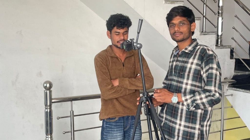 Vijay Bairagi, the influencer who runs the “Vidisha Shahar” account and a young Vivek Raj, a BTech student who has learnt video editing and reels from “Vijay Bhaiyya”. Sabah Gurmat | ThePrint