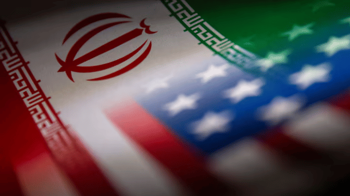 Iran's and U.S.' flags are seen printed on paper in this illustration taken January 27, 2022. REUTERS/Dado Ruvic/Illustration Purchase Licensing Rights