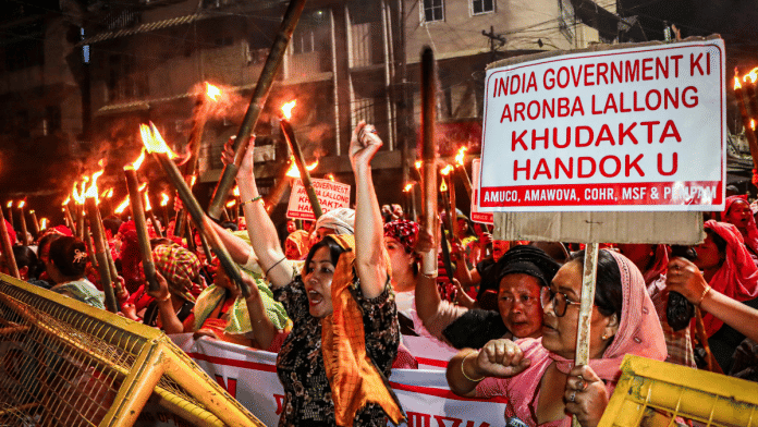 Meira Paibis (women torchbearers) during their protest against the Tronglaobi killing incident at Khurai, in Imphal on Friday | ANI