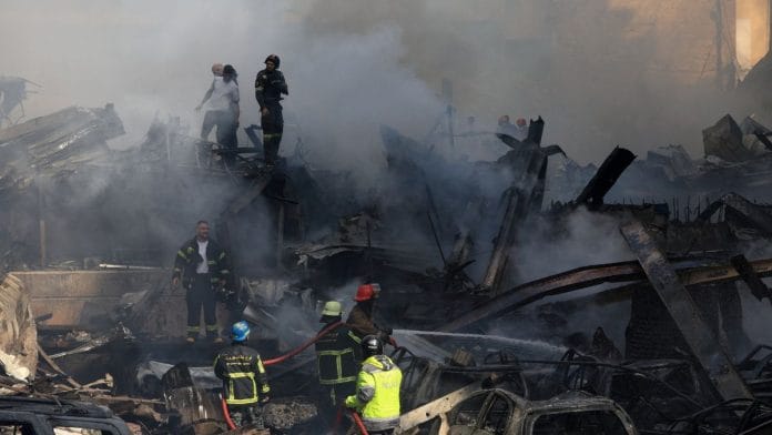 Rescuers work at the site of an Israeli strike in Beirut, Lebanon, April 8, 2026. REUTERS/Mohamed Azakir