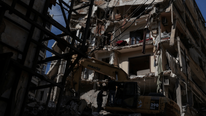 Emergency services operate at the site of an Israeli strike at Ain Al Mraiseh in Beirut, Lebanon | REUTERS/Louisa Gouliamaki