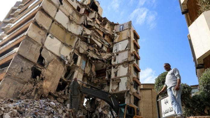 Damaged buildings at Kafr Kila following Israeli army activity across the border between Israel and Lebanon, as seen from Metula on the Israeli side of the border, 9 April, 2026 | REUTERS/Ammar Awad