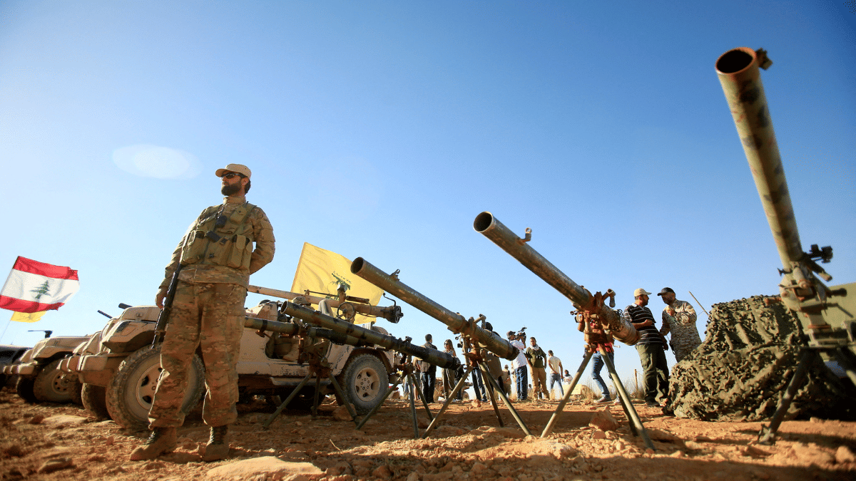 A Hezbollah fighter standing next to anti-tank artillery at Juroud Arsal, the Syria-Lebanon border | Reuters File Photo