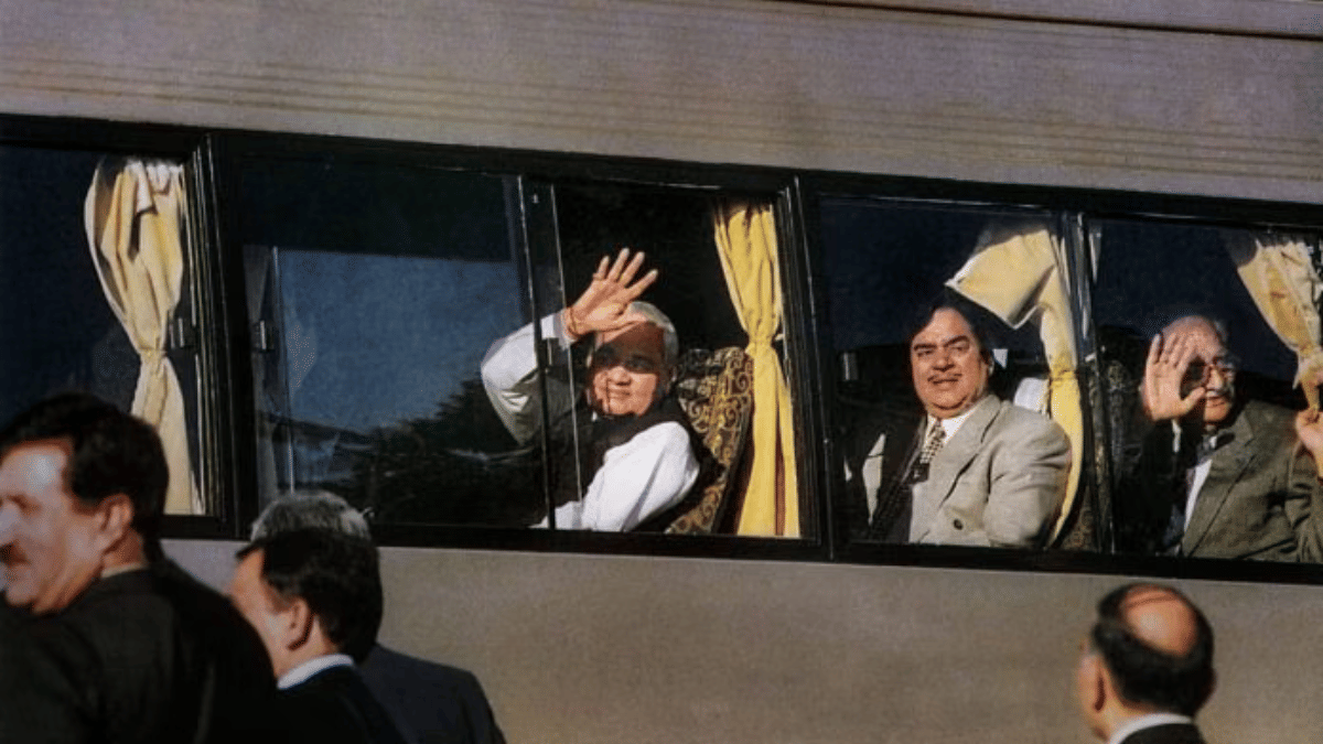 In photo from February 19, 1999, former prime minister Atal Bihari Vajpayee waves from the maiden Delhi-Lahore bus service on his arrival at Lahore to attend a summit in Pakistan | PTI File