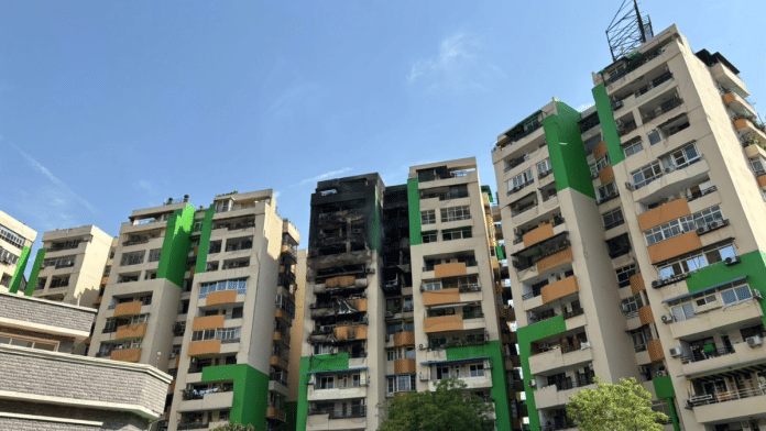 The high-rise at Gaur Green Avenue society in Ghaziabad’s Indirapuram after the fire was brought under control | Samridhi Tewari | ThePrint