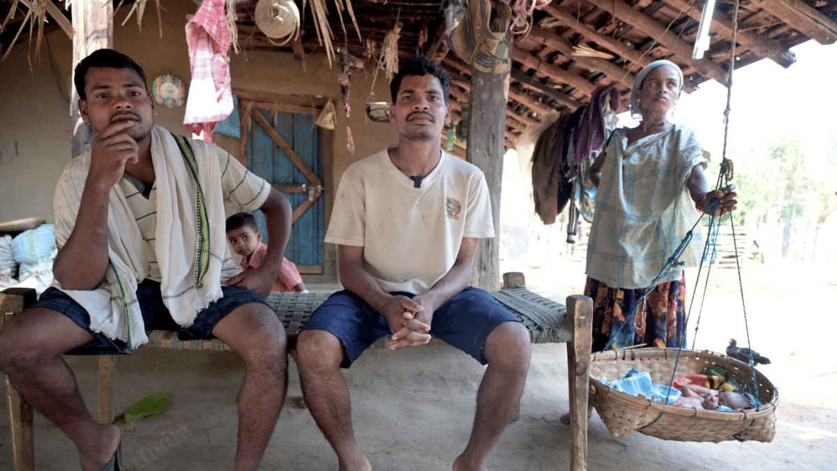 Madvi Mukka (left) and his elder brother Madvi Deva at their house in Sukma's Puvarti | Mayank Kumar | ThePrint