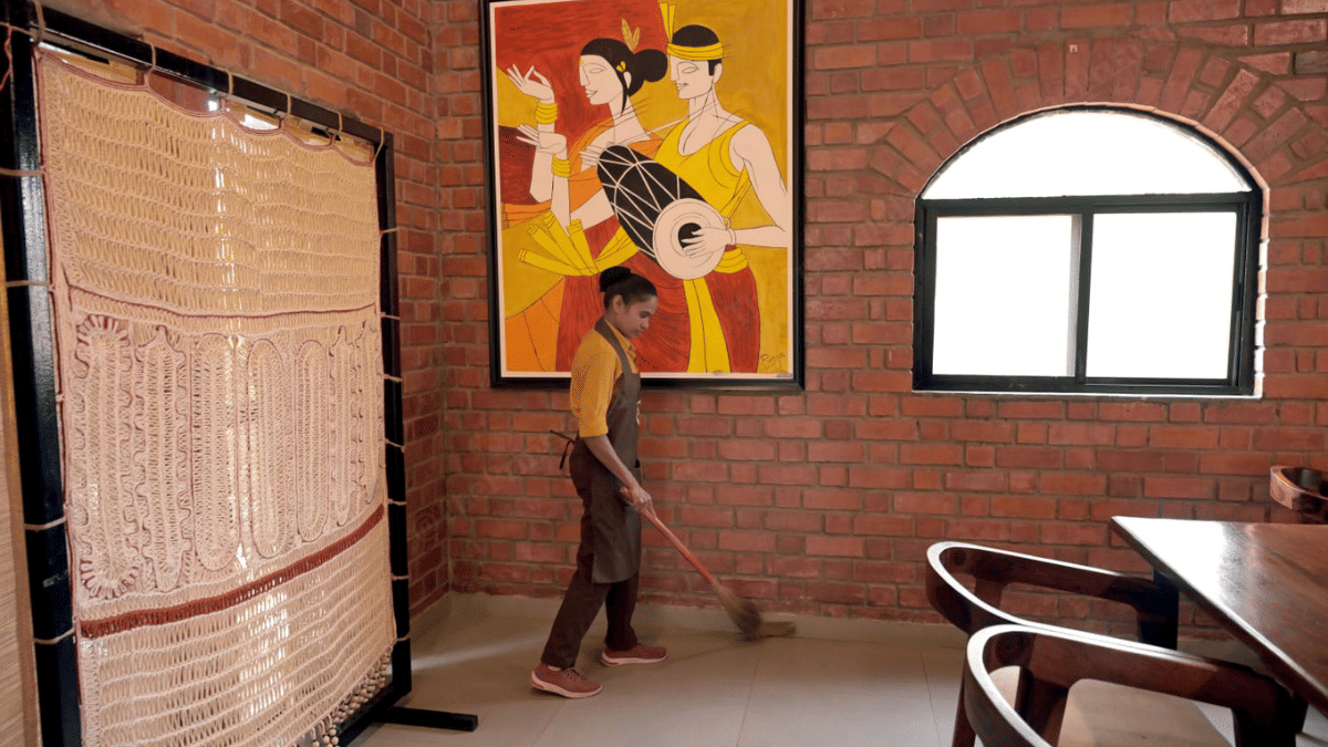 Former Maoist cadre Pagni doing cleaning work at Jagdalpur's Pandum Cafe | Mayank Kumar | ThePrint