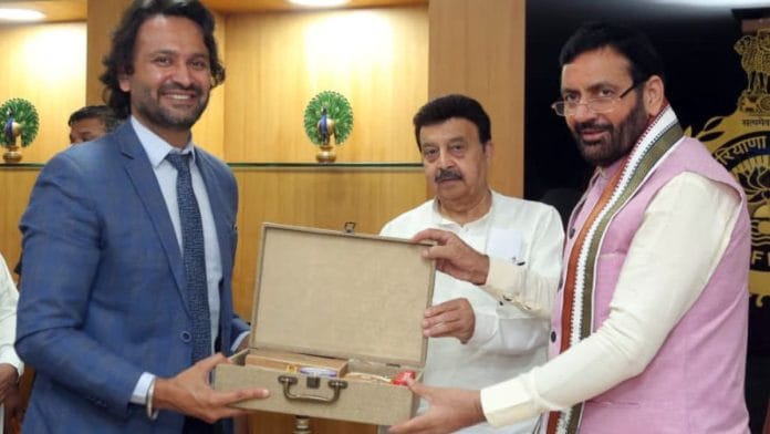 Haryana CM Nayab Singh Saini (right), with commerce and industry minister Rao Narbir Singh (centre), and industry leaders | Photo: By special arrangement